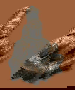 Antique Indian Goddess Deity Sculpture: A carved wooden Hindu effigy, possibly that of Parvati, the wife of Shiva, certainly a Goddess. The sculpture has good age, and an old repair with a nail on one hand. The carving measures 12 x 9