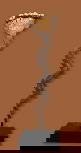 A Gan Multi Headed Iron Snake Currency Ex Kahan Gallery: A very old and weathered iron currency wand in the form of a Multi headed serpent. Gan peoples, Burkina Faso, West Africa. The iron Measures 12 inches tall on custom display stand. Provenance: Ex