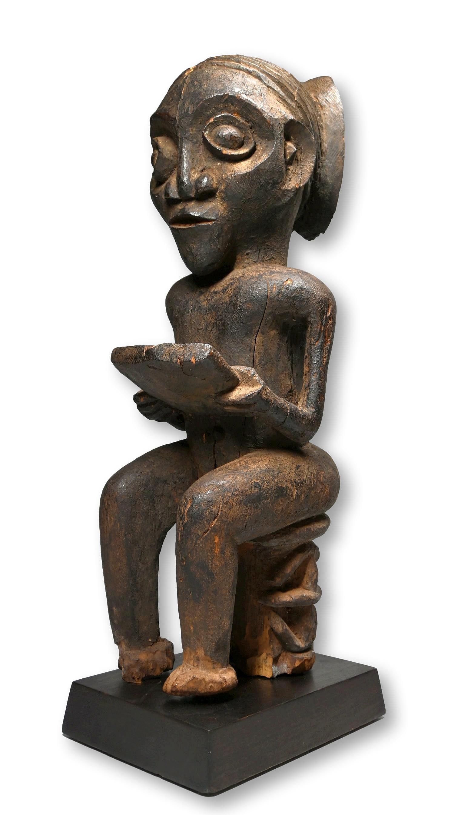 A Bamun Sculpture of a Male reading from a Book (1 of 10)