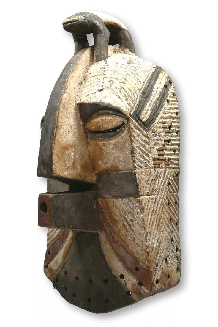 A Luba Kifwebe Mask with Zoomorphic Finial (1 of 7)