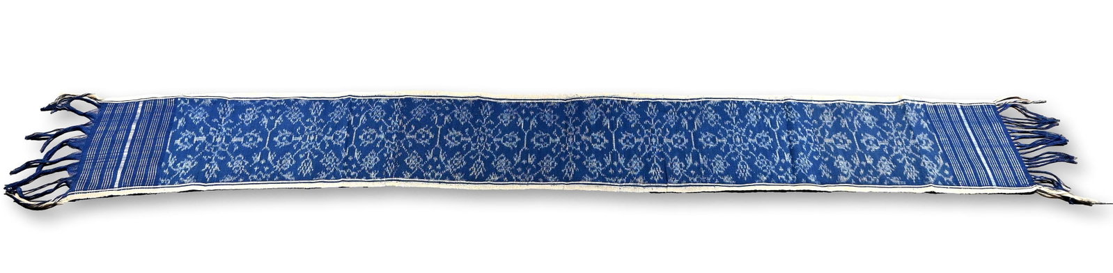 Long Indigo Ikat Ceremonial Sash: A long indigo Ikat sash found in Tenganan village, Bali, Indonesia. I collected this piece personally from the family of Ketut Panaca, and according to him years to complete, from the harvest of the c