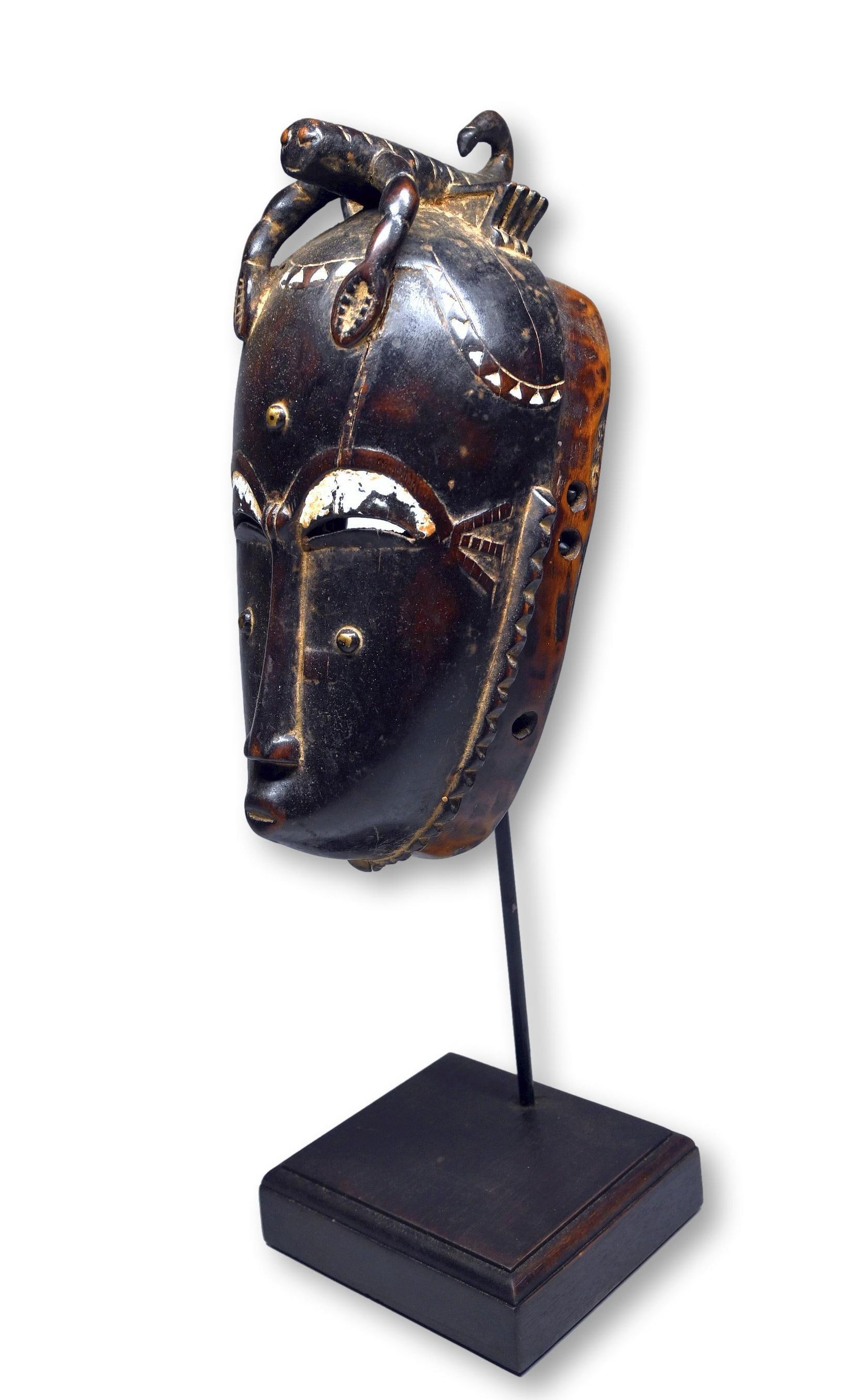 A Baule Mask with Scorpion Motif (1 of 6)