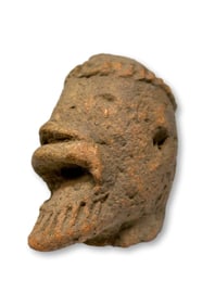 A Komaland Head Fragment with wide open Mouth
