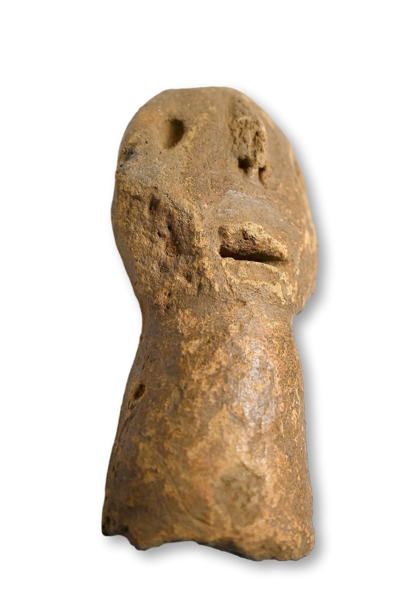 Ancient Bura Relic from Africa: This is a relic of the Bura-Asinda-Sikka culture dating from the 3rd to 11th century, Niger, West Africa. A terracotta fragment of a larger sculpture with archaic face. The relic measures 4.5 x 2.5 in