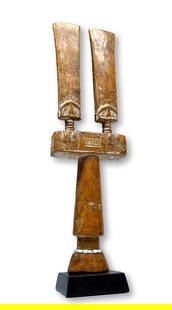 A Rare Fante Twin Doll Ex Merton Simpson Gallery: A very uncommon and rare example of a carved wooden double or twin Fante doll decorated with incised linear designs accented with kaolin clay pigment and embellished with old glass beads.Fante peoples