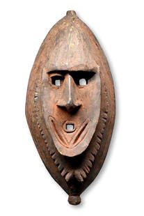 A Lower Sepik River Mask: A Lower Sepik mask, Possibly Keram River. East Sepik or Madang province, Papua New Guinea.Of typical form, the mask with concave face with small mouth. The surface worn and well weathered. This mask,