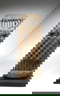 A Dogon Nommo Sculpture: A sculpture of four male and female ancestors in a classic style that relates to the myth of Nommo, who according to Dogon beliefs, came down from the heavens in an Ark, and at some point divided