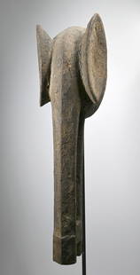 A Bamana Elephant mask: A long carved wooden mask with encrusted surface and classic form. Bamana peoples, Mali, West Africa. Such ‘elephant masks’ play an important role in the initiation ceremony of the Bambara youth,