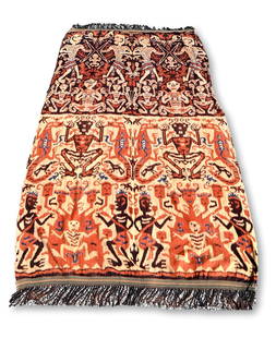 Huge Ceremonial Ikat Hingii Textile from Sumba Island: A large ceremonial ikat Hingii blanket / textile often worn by the men of the tribe. This is a very large hand loomed and well used older ceremonial Ikat sarong / tube skirt with geometric motifs. Fie