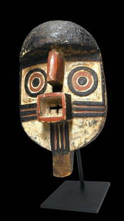A Bwa Mask Ex William Wright Gallery: A carved wooden ceremonial mask with incised linear designs accented with black, white and red kaolin clay pigments. This Zoomorphic mask represents a stylized monkey. Bwa peoples, Burkina faso, West