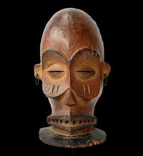 A Chokwe Cihongo Mask Ex TAD, Ex Nooter: A very finely carved early 20th century male dance mask called tshihong, used in festivals to summon the spirits of strength, and symbolizes wealth and power, the mask also confers judiciary powers to