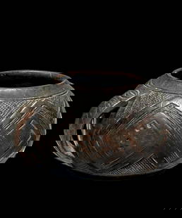 A Kuba Cup Ex Nancy Nooter, Ex TAD , Ex Bonhams: A very fine old 19th to early 20th century carved wooden beaker or cup. Fine incised designs throughout with rich original patina and age-appropriate surface patina wear. Kuba peoples, Democratic Repu
