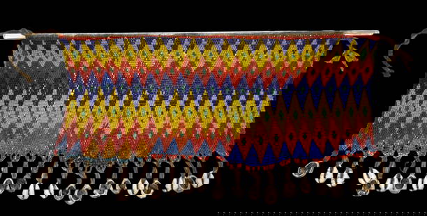 Antique Kirdi Beaded Apron Panel: A very fine old beaded panel of a skirt, a colorful cache-sex, or pikuran, from the Kirdi people of Cameroon. This skirt was probably worn by a younger woman for protection against the evil eye and