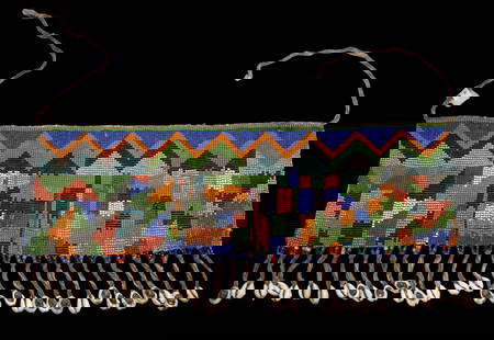 A Fine Old Kirdi Skirt Panel: A very fine and rare old beaded panel of a skirt, a colorful cache-sex, or pikuran, from the Kirdi people of Cameroon. This antique beaded skirt with colorful geometric designs was worn by some
