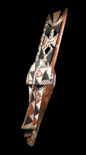 A Bobo Syekele Mask, Exhibited, Published: A monumental carved wooden helmet style plank mask created by the Do society for local farmers to act as a protective force against forest spirits and malevolent forces. Known as Syekele, this is a la