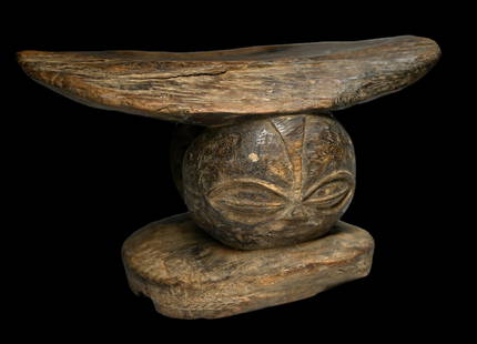 A Luba Stool Field Collected: A carved wooden stool with janus mask faces and a very well handled and worn surface. Luba peoples, DRC/ Congo, Africa. The Lidded vessel measures 9.75 x 6.25 inches. Provenance: Field Collected