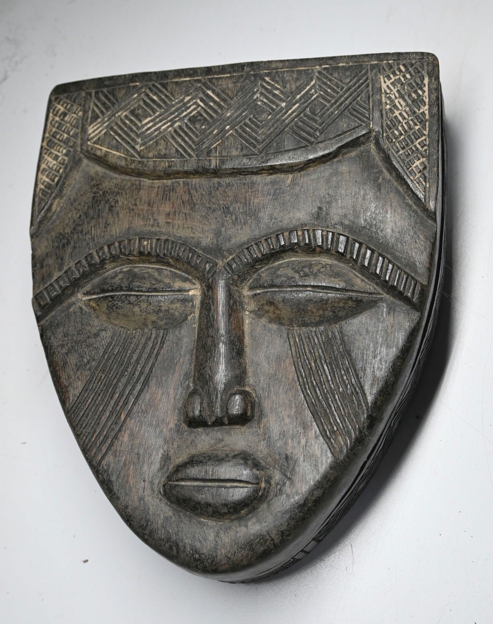 A Kuba Box with Mask face (1 of 5)