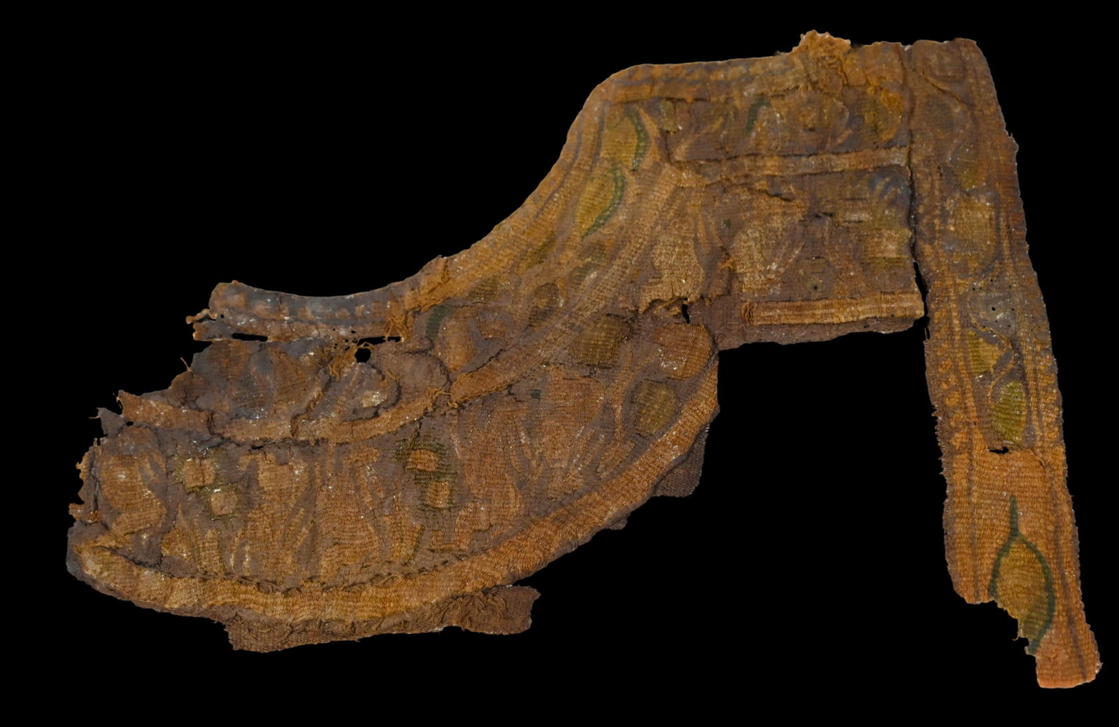 Fragment of An Ancient Egyptian Tunic: A rare large fragmented section of an ancient textile dating from the 3rd-10th century, Egypt and the Coptic peoples. The fragment features beautiful green and gold colors, floral designs and faded sy