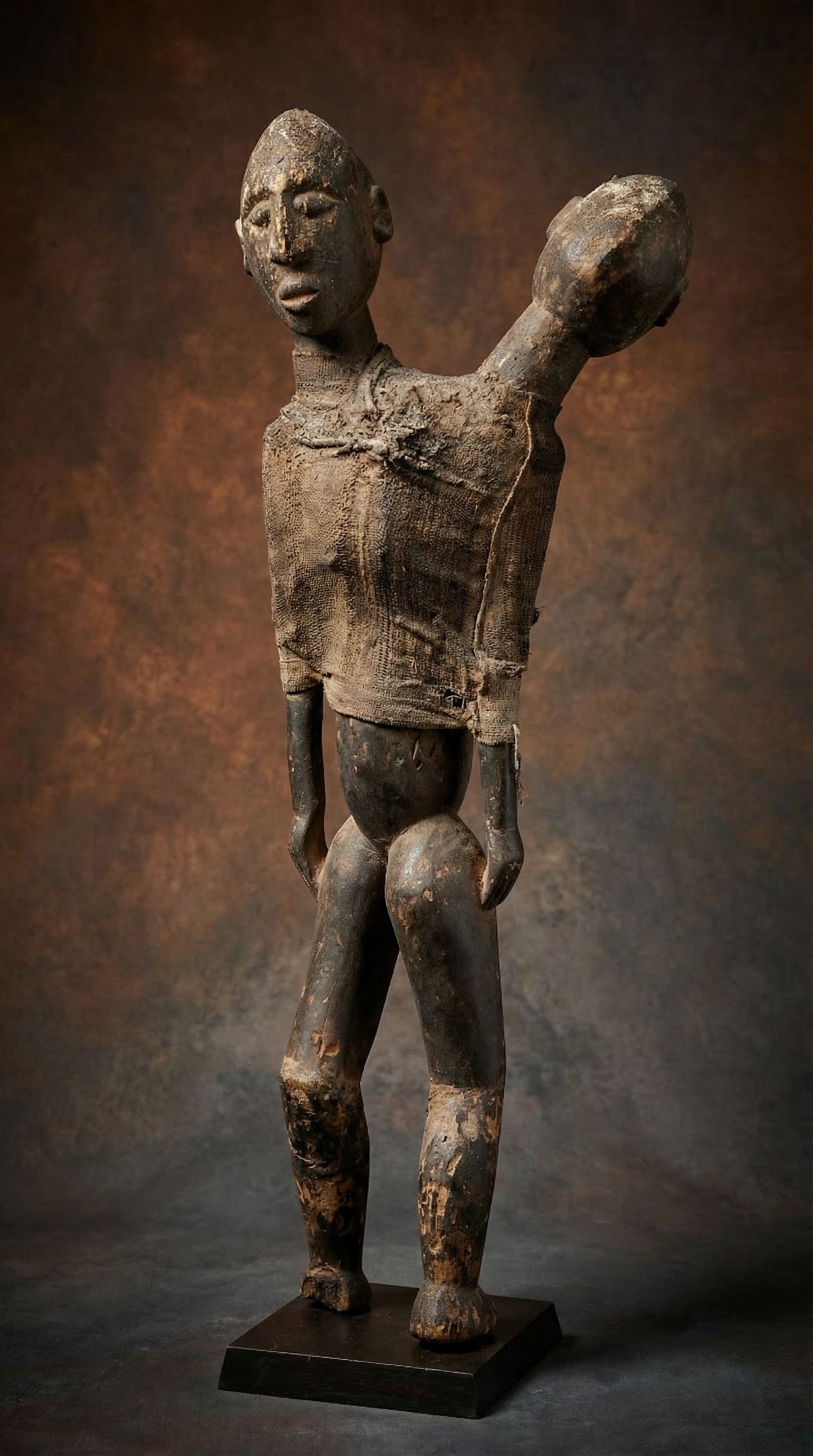 A Rare Lobi Janus Sculpture Ex William Wright Gallery: A very rare and fascinating wooden shrine sculpture of a male and female spirit figure, note how the heads are looking and the legs moving in opposite directions, a wonderful work of Lobi spirituality