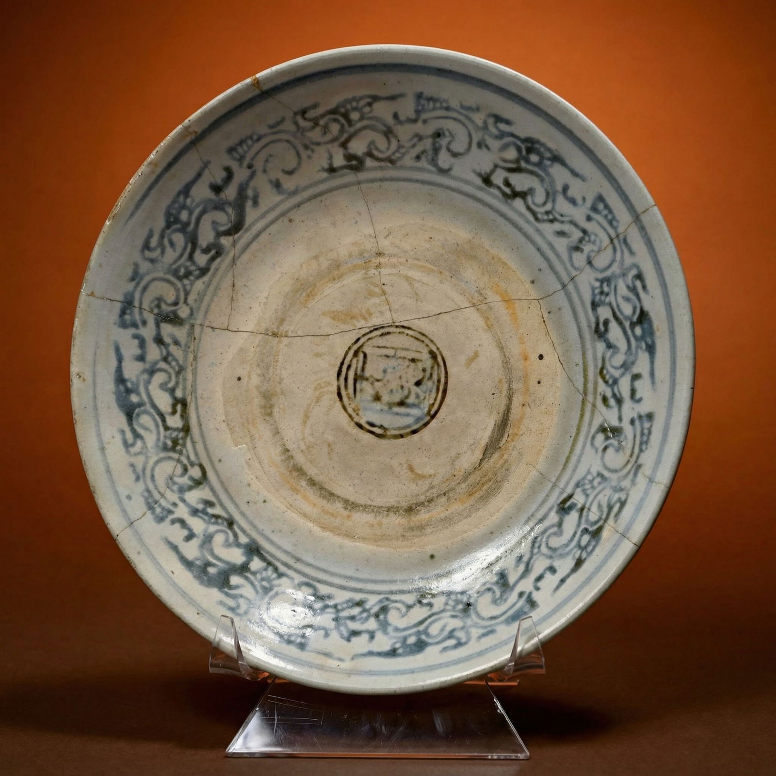 15th Dynasty Plate From Vietnam: A Fine Blue and White platter from Vietnam, likely Le Dynasty and dating to the 15th century. The previous collector reports that this plate was likely a shipwreck recovery. WE have no further
