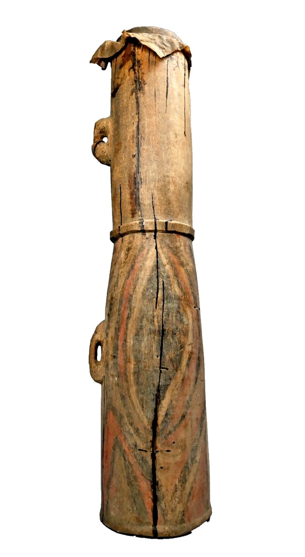 Antique Abelam Kundu Drum, Papua New Guinea: An old and well used Abelam Tumbuna Ceremonial drum, North Eastern Papua New Guinea. Of classic form where the base seems a bit larger than the top and with a well handled and weathered surface patina