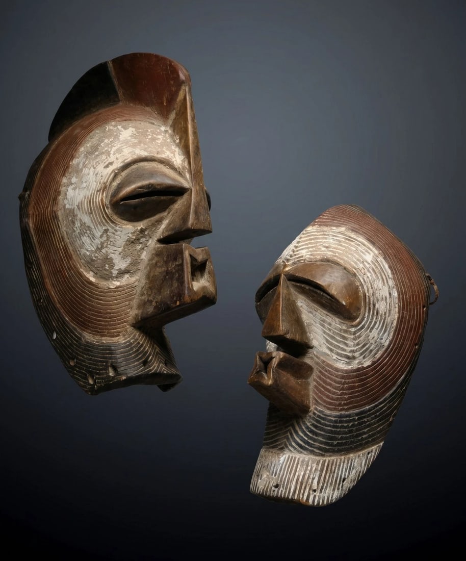 A Pair of Male & Female Songye African Masks (1 of 10)