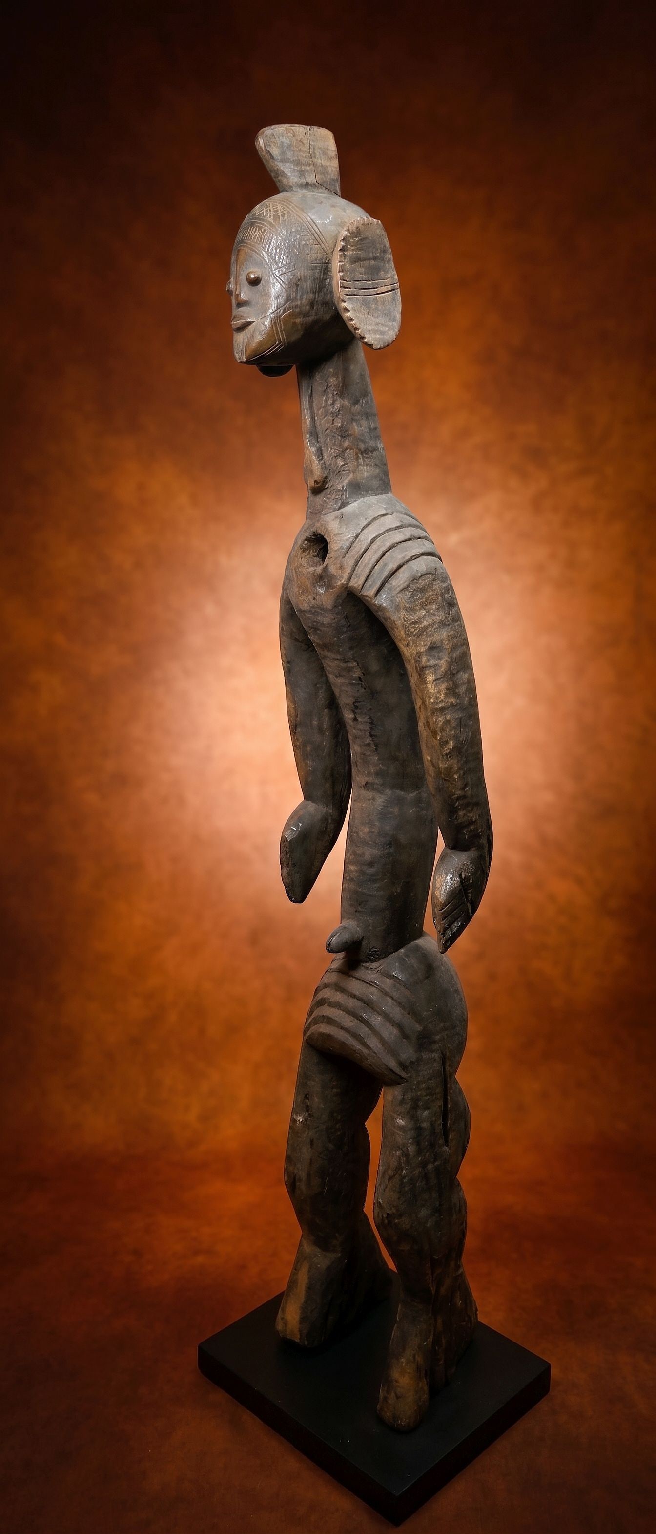 A Tall Mumuye Healing Idol: A Tall carved wooden shrine idol known as Iagalagana, some were used as oracles, others in connection with healing, and still others reinforced the status of important elders as embodiments of vaguely