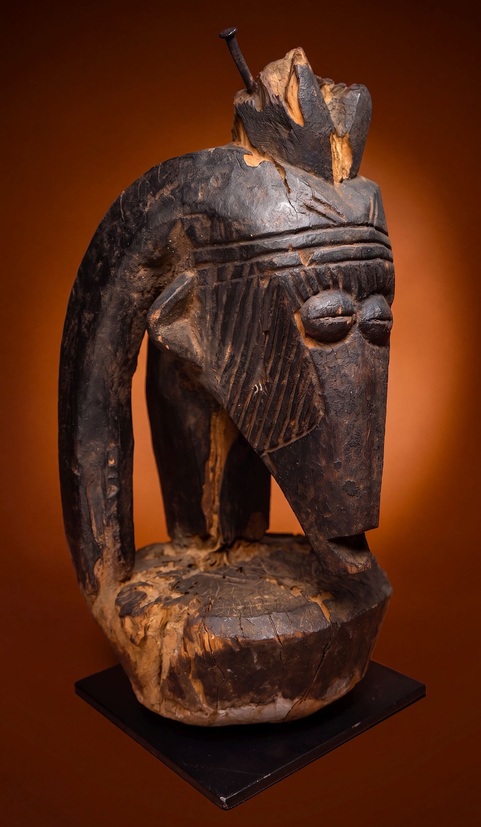 Eshan Rams Head Ancestor Shrine Sculpture: Among The Eshan, a shrine is created to worship mythical ancestors or a recently deceased patriarch. Carved Rams heads such as this example were known as osanmasinmi, and were placed on oju'po or
