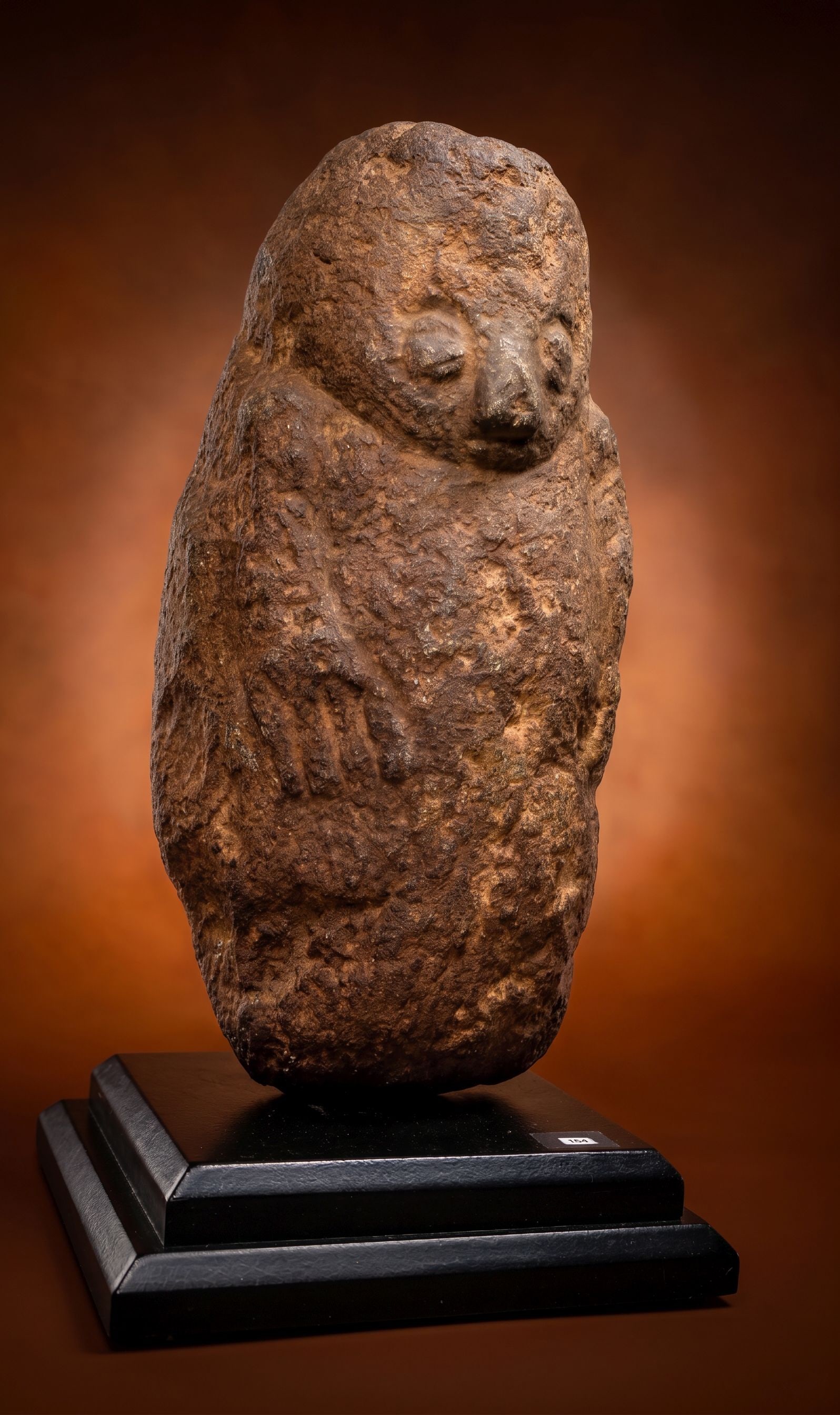 A Bongo Commemorative Stone Sculpture: A rare carved stone effigy of an ancestor spirit, from a a very heavy and dense stone. Bongo stone sculptures and funerary heads are rare, ancient artifacts created by the Bongo people of the Bahr el 