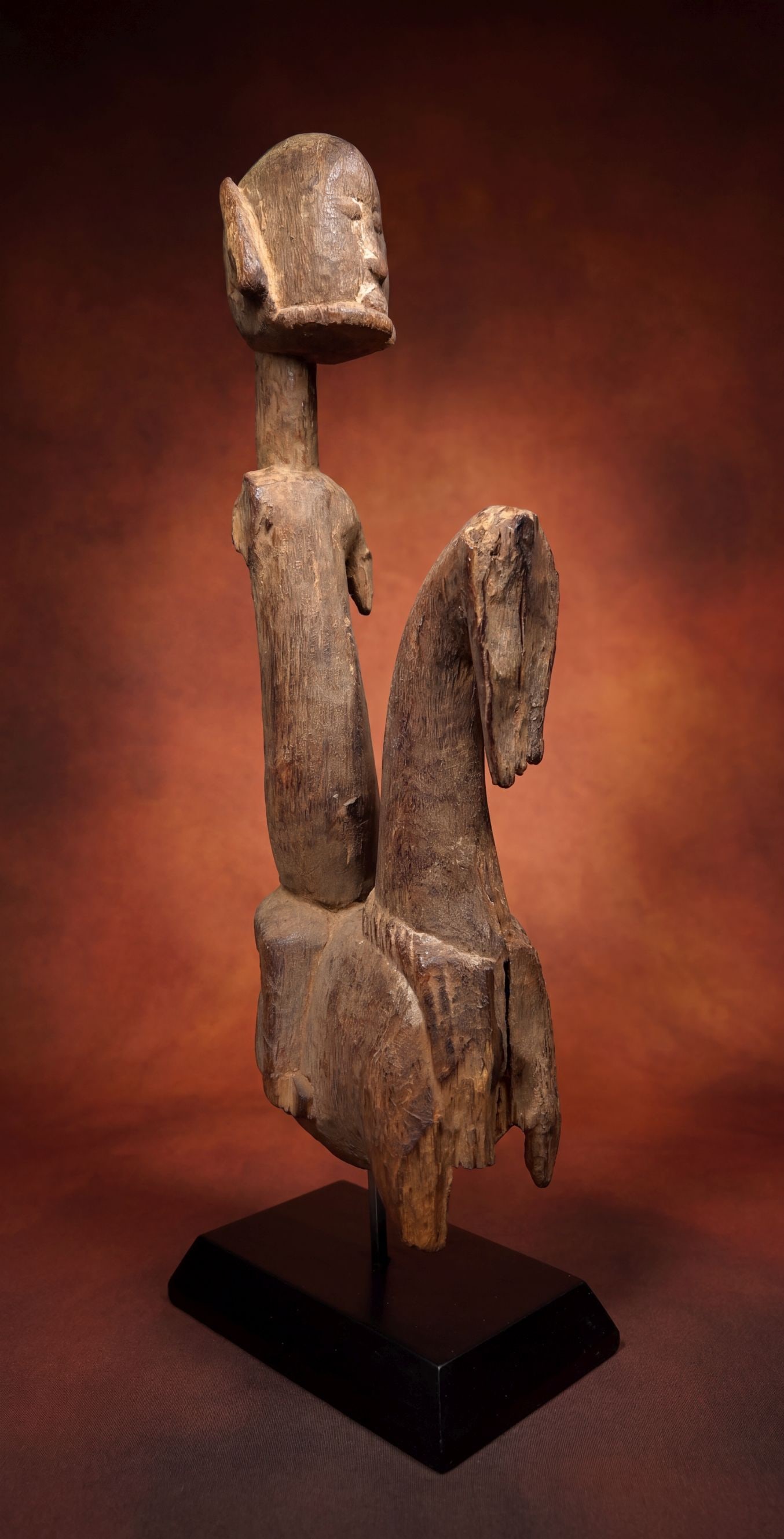 A Dogon Equestrian Sculpture: A very old and weathered sculpture of an equestrian from Mali, West Africa. The Dogon peoples would carve horse and riders as symbols of prestige and power among the community. The horseman were