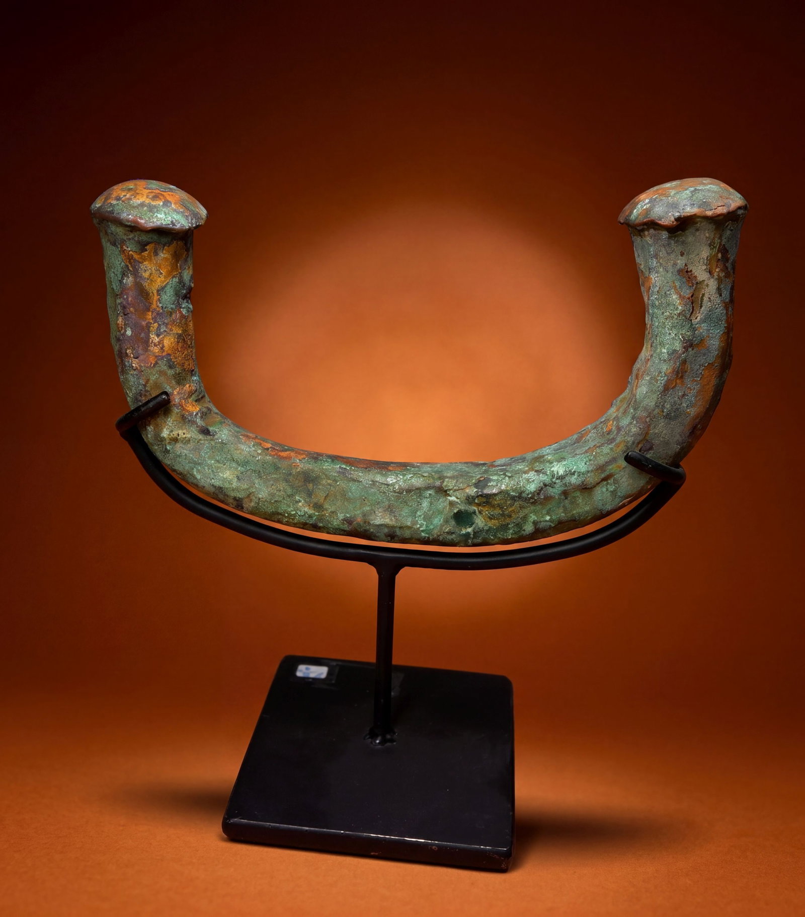 A Large Queen Manilla Currency From Nigeria: This is a 19th century or older example of a trade unit known as a Manilla. Large, heavy examples of manillas such as this example sometimes were referred to as ‘king’ or ‘queen’ manillas and 