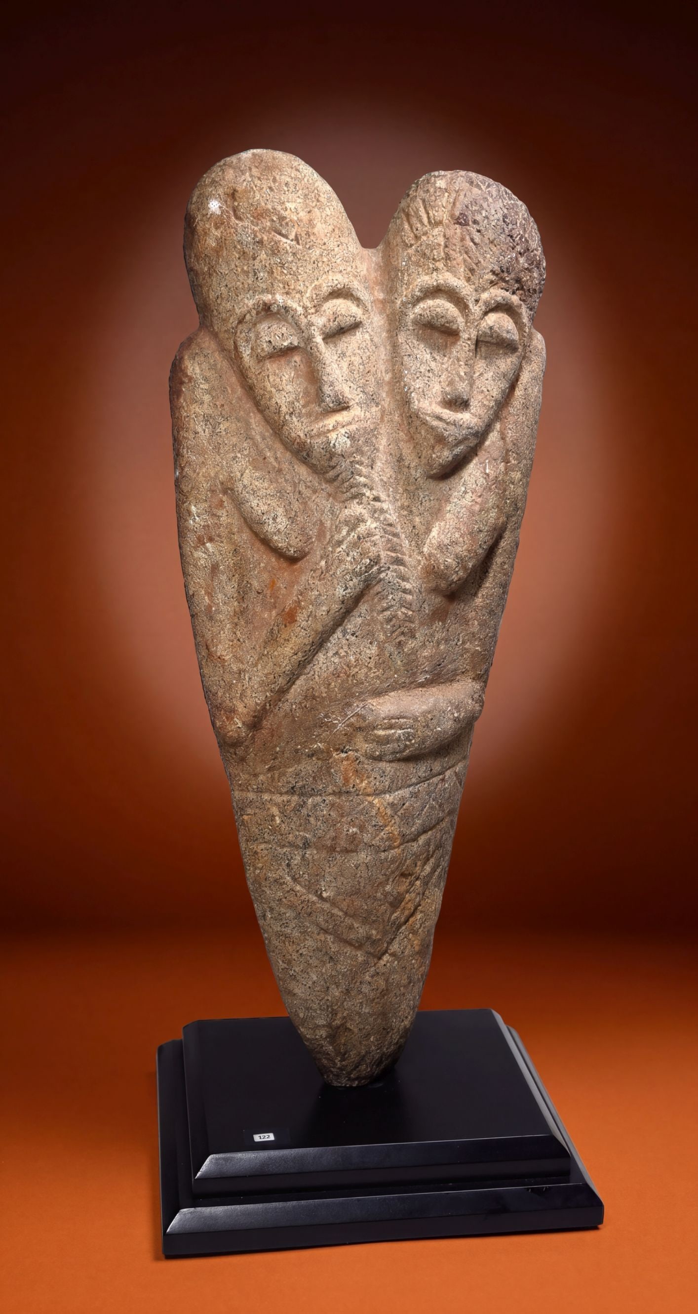 Stunning Dogon Sculpture of a Couple: A fantastic carved stone effigy of a couple with highly stylized features and form. The stone measures 27 inches tall x 9.5 inches wide. Dogon peoples, Mali, Africa.
