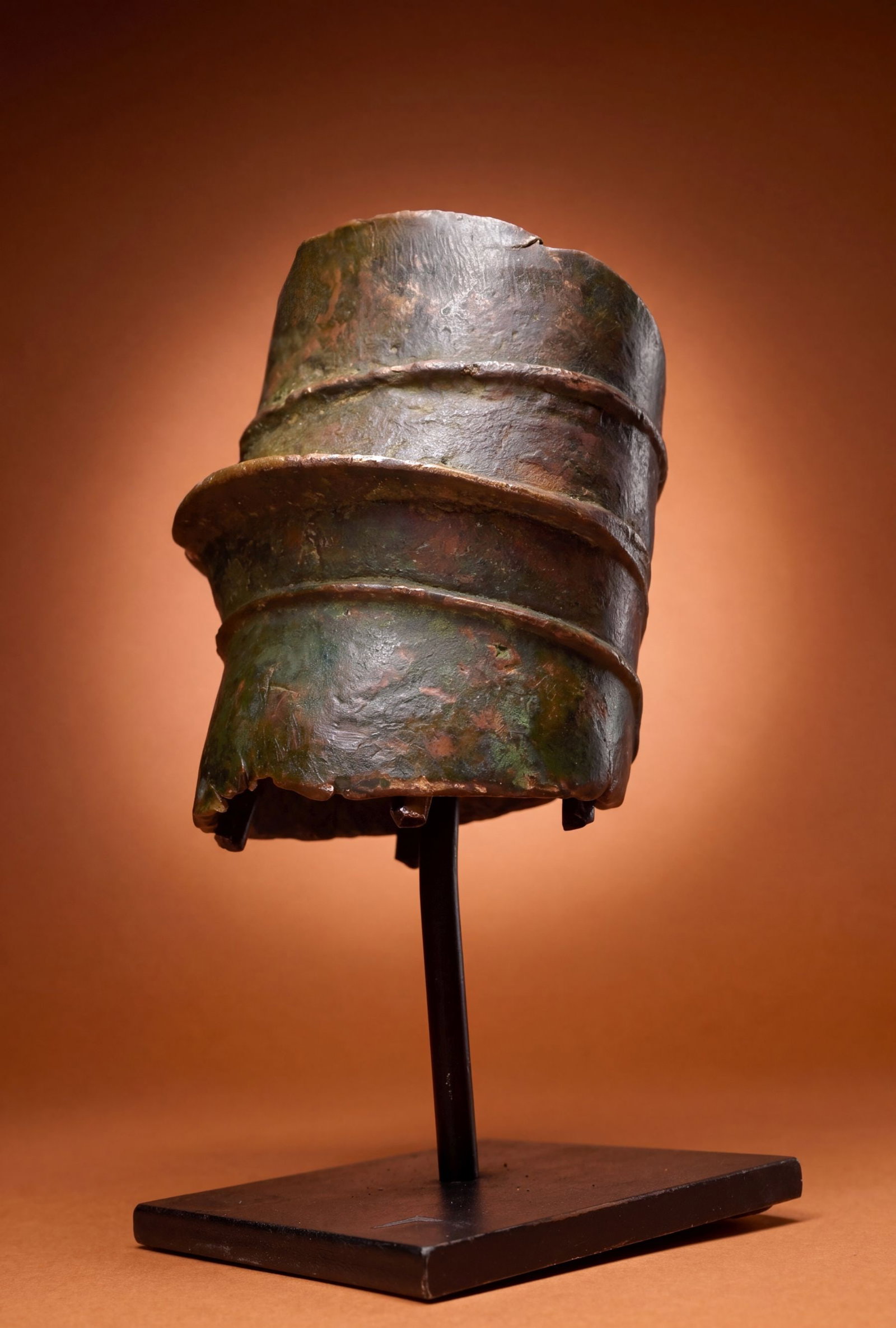 Old Ekonda Anklet: A heavy old bronze / copper anklet with ribbed form and signs of age and field use. The Anklet measures 10 x 5 inches on its custom display stand and is very heavy. Konda peoples, DRC/ Congo, central