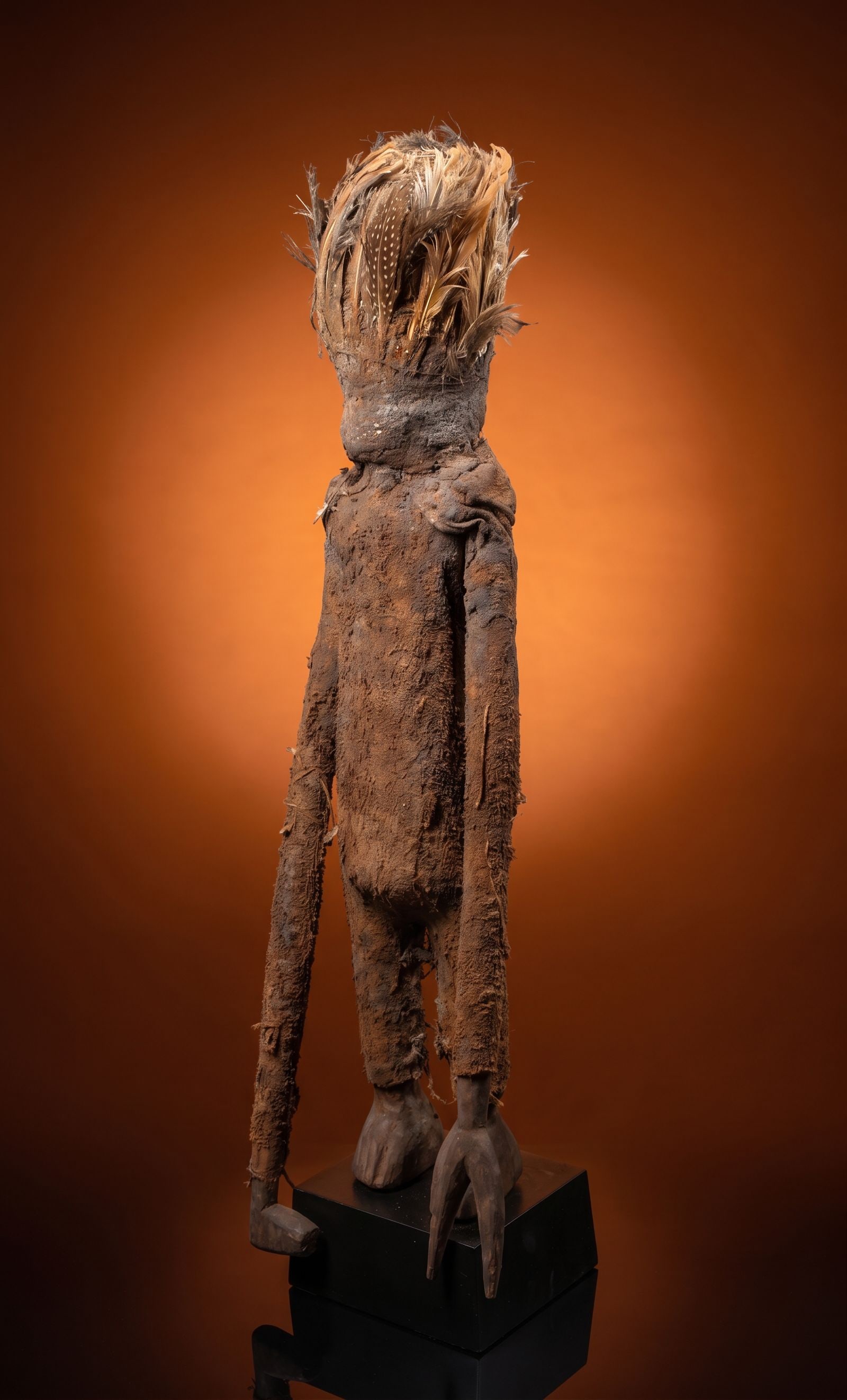 Senufo Kafigeledjo Divination Oracle: A carved wood and textile hybrid oracle figure traditionally used in ritual divination practice known as kafigeledjo "he who speaks the truth". The figures give visual representation to invisible bush