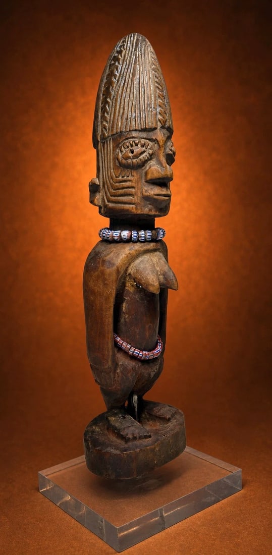 A Tall Female Yoruba Ibeji Twin Sculpture (1 of 5)