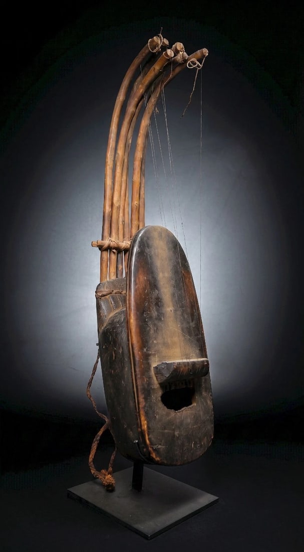 Antique African Bow Lute on Display Stand.