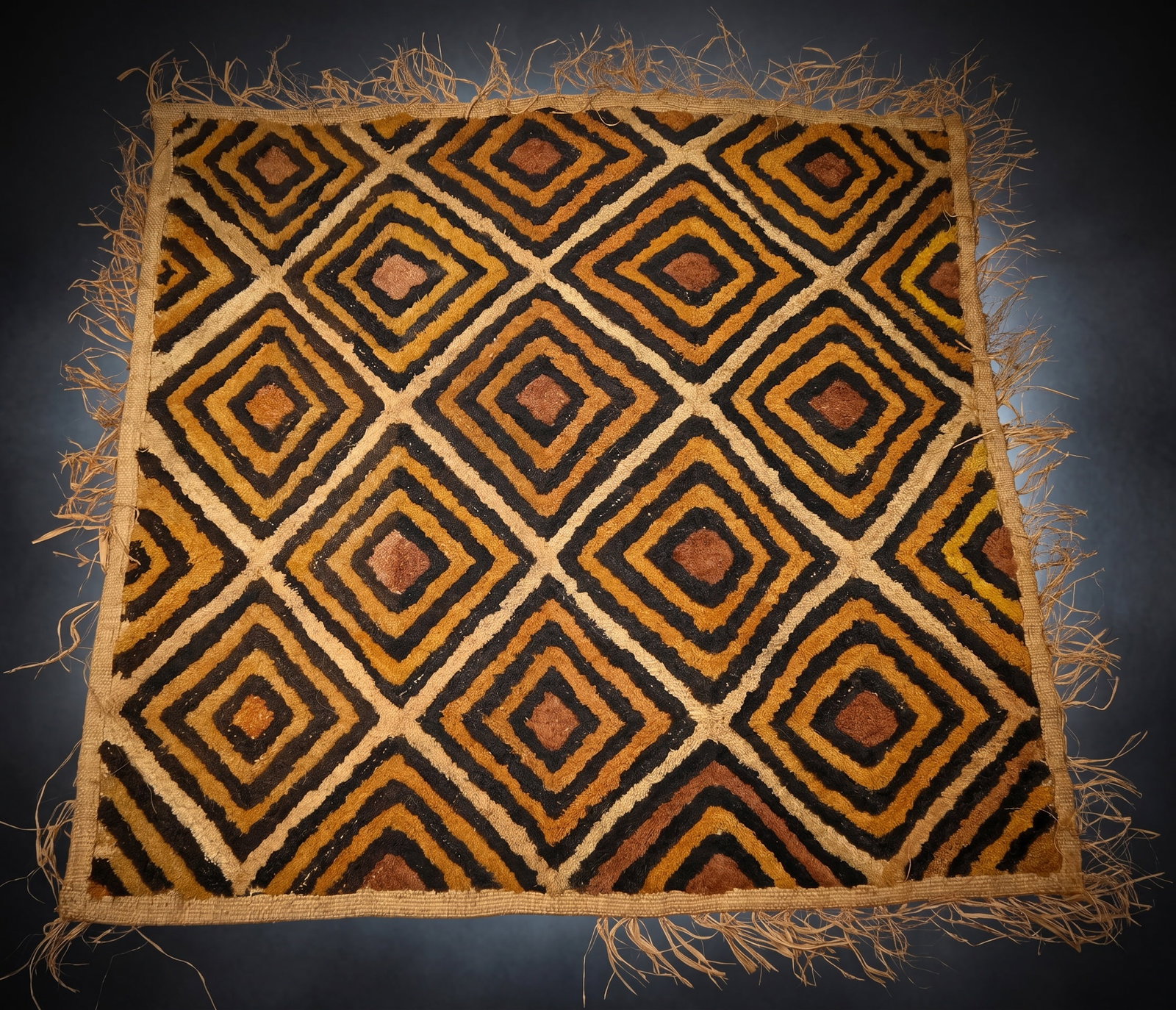 A Kuba Kasai Shoowa Velvet, Kuba Cloth Ex Greene Collection: A fine antique Kasai Shoowa velvet textile, woven completely from raffia grass into a plush feeling textile with an intricate design. Kasai velvet, also known as Shoowa cloth or Shoowa velvet, is an i