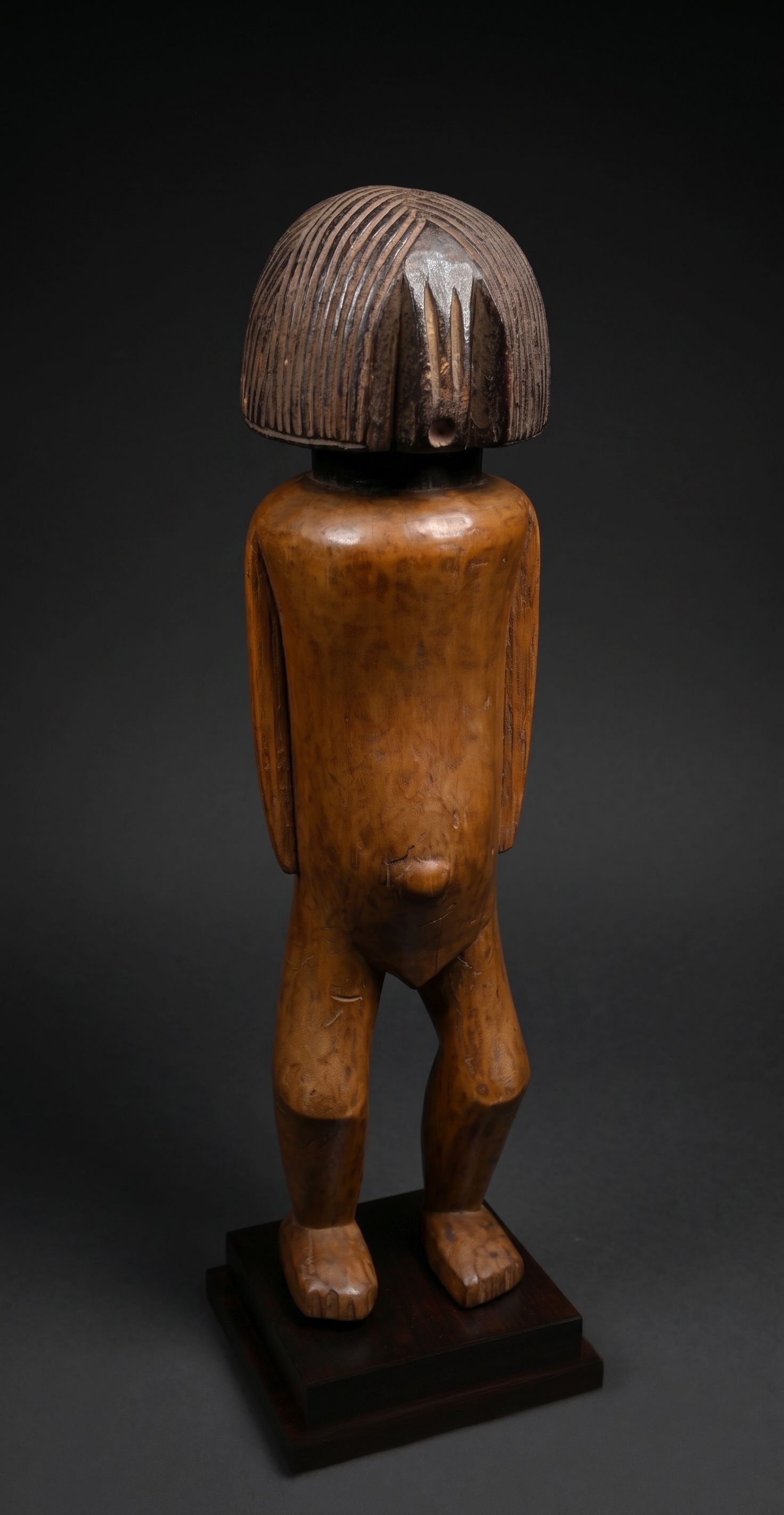 A Tumbwe Sculpture, African Art: A unusual and interesting wooden carved sculpture of an ancestral spirit that is possibly attributed to the Tumbwe peoples, a Tabwa region group or possibly the Azande peoples. The sculpture measures 