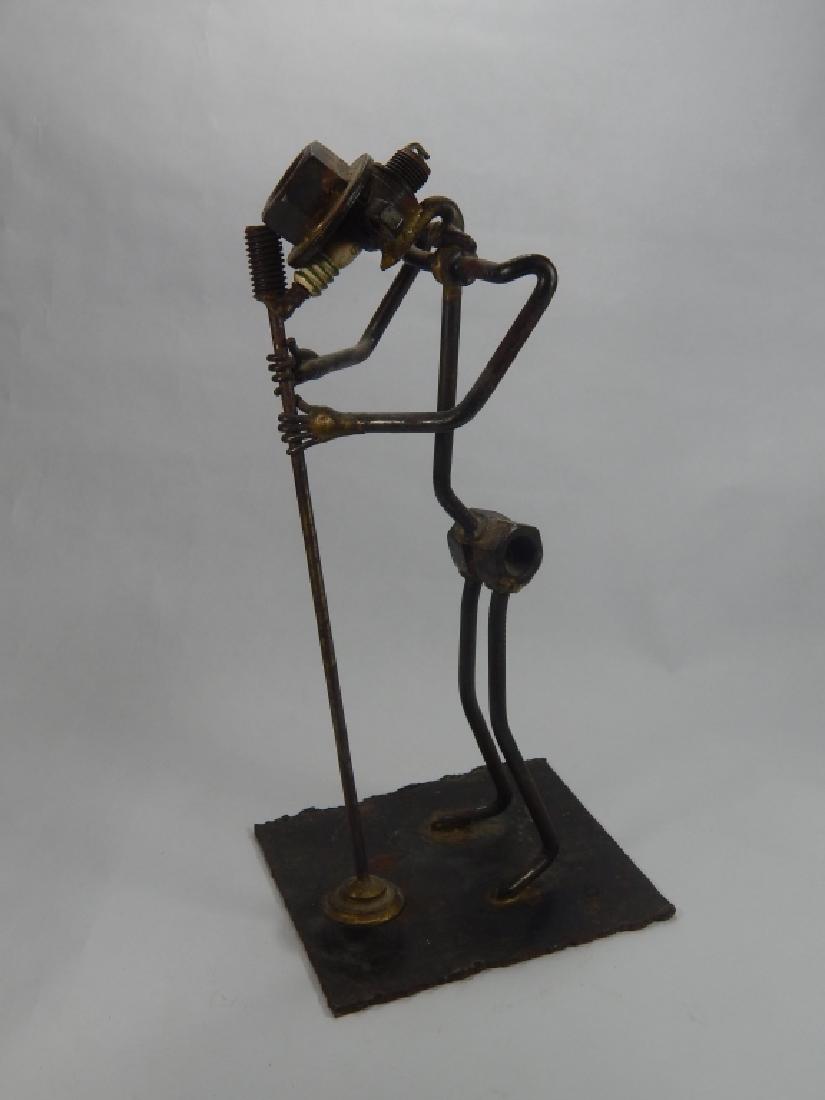 AFTER F.RUSSO NUTS AND BOLTS "SINGER" SCULPTURE: AFTER ARTIST F.RUSSO VINTAGE SCULPTURE OF "SINGER", MADE WITH NUTS AND BOLTS. MEASURES 11 1/2" HEIGHT.