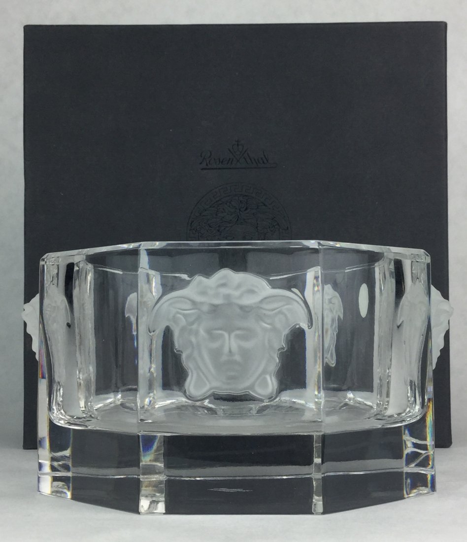 VERSACE Crystal Wine Coaster with Box: Luxurious accessories for exclusive taste. The taste of the versace collection. Versace Crystal Medusa Bottle Coaster comes with Original box & Certificate. Measures: 3 1/4" Tall x 5" wide.Founded in