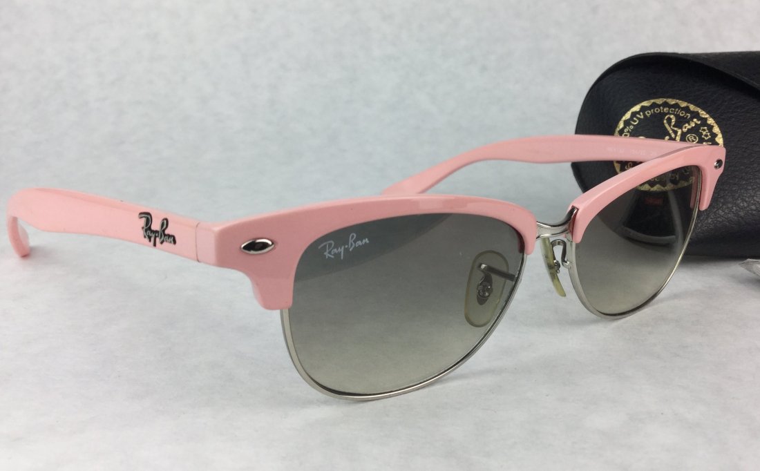 RAY BANS Hot Pink RB4132 Clubmaster Sunglasses: Rare Ray-Ban RB4132 Clubmaster, 759/32 A. Comes with case and cloth. Gorgeous Hot Pink.Brand: Ray-BanGender: UnisexYear: 2011Frame Color: Pink SilverLens Color: Grey ShadedFrame Shape: WayfarerFrame S
