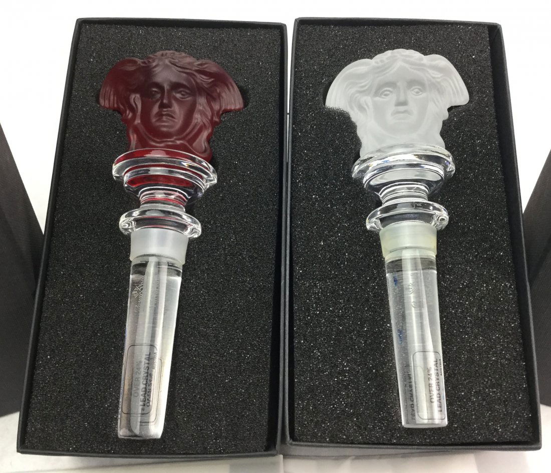 2 VERSACE Crystal Medusa Wine Stoppers: Fabulous Collection of 2 VERSACE crystal Medusa wine stoppers by Rosenthal. Both come with original boxes.