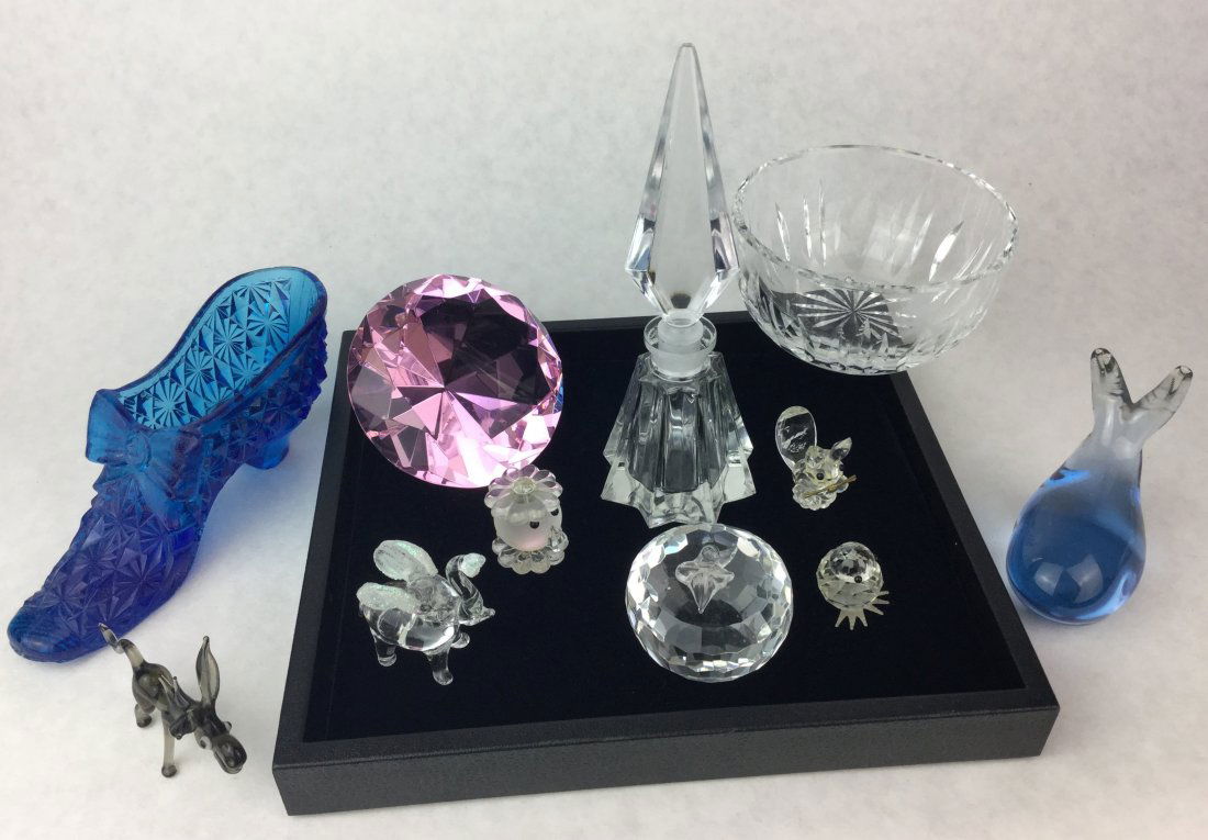 Estate Crystal & Vanity Decor: Gorgeous Collection of decor and vanity items out of Laguna Beach Ca. estate. Lot includes crystal perfume bottle, Waterford cut crystal bowl, art glass whale paperweight, Blue glass boot by Fenton an