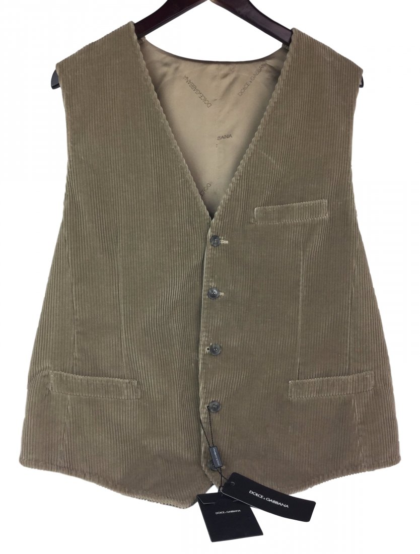DOLCE & GABBANA Corduroy Vest 52: Impressive Dolce & Gabbana corduroy vest with plaid backing. Tie back. Made in Italy. Color: Tan, size: 52. Measurements approx. 52cm x 38cm.