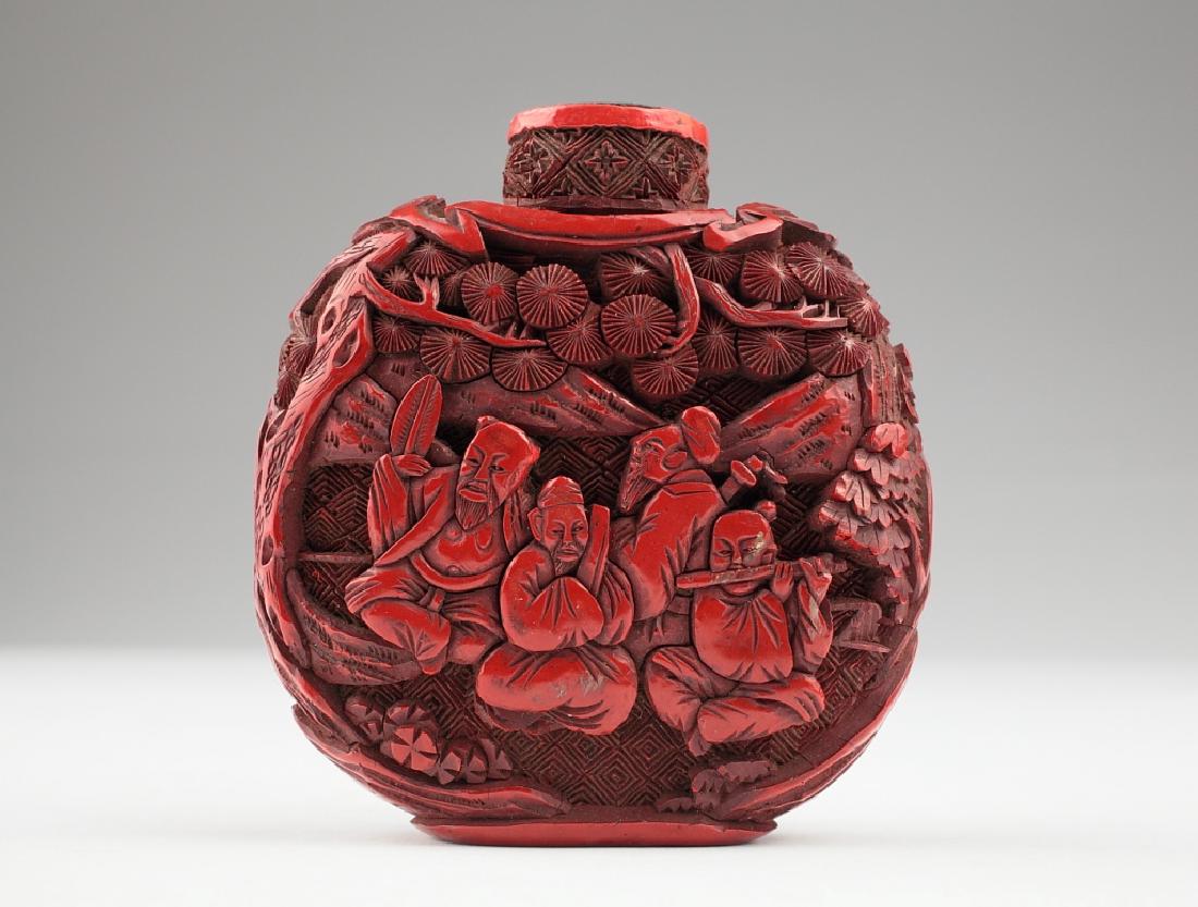 A Chinese carved cinnabar lacquer snuff bottle, (1 of 11)