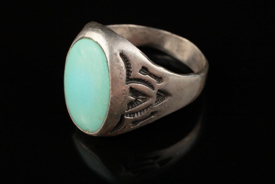 A southwest Indian turquoise silver man's ring, (1 of 5)