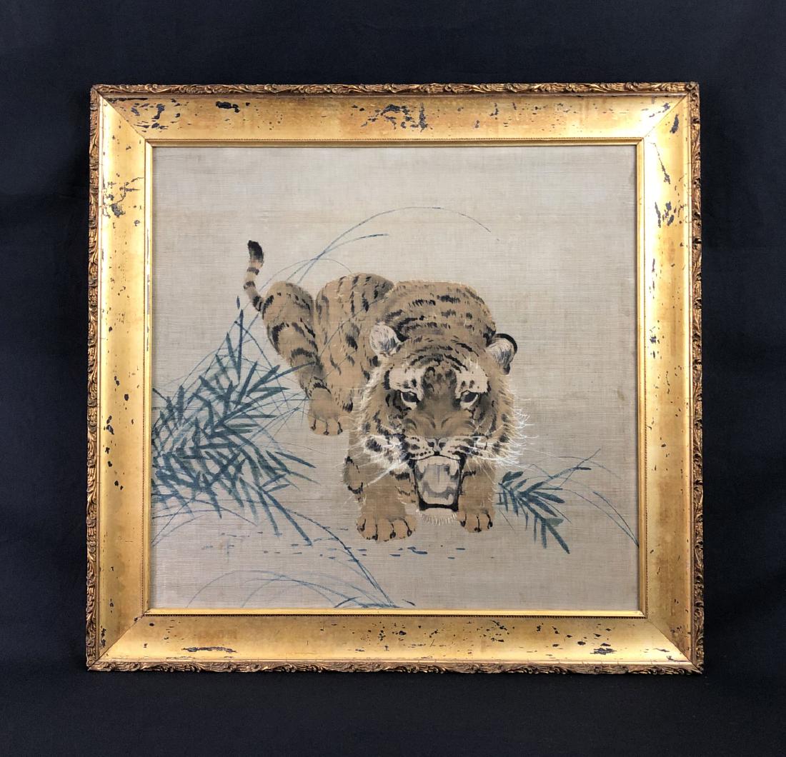Antique Japanese Painting -- Hand Painted Watercolor on: This lot consists of a watercolor painting on silk framed under glass. Image depicts a tiger crouching amid shoots of bamboo, his teeth bared and muscles tensed. Appears to be an early 20th-century pi