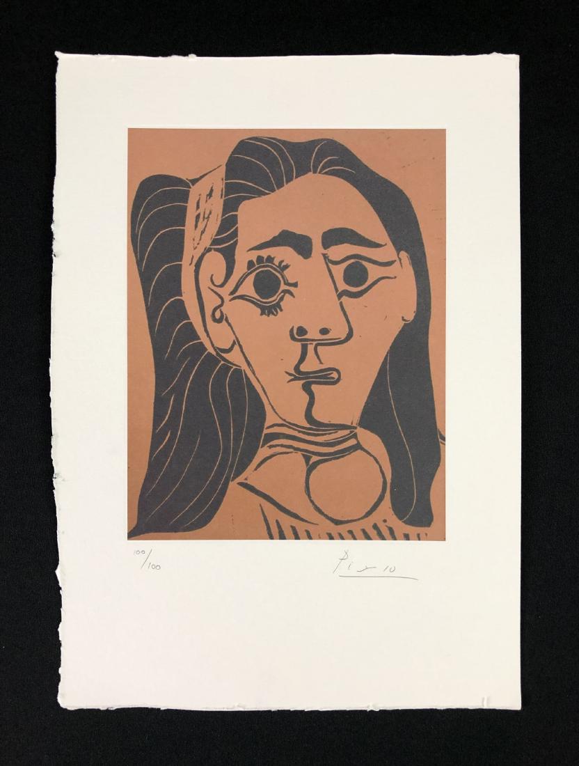 Pablo Picasso (Spanish, 1881-1973) -- Hand Signed Fine: This lot consists of a fine art print on paper, hand signed "Picasso" and numbered "100/100" in graphite at bottom. Image depicts the face of woman, which could practically leap from the paper with th