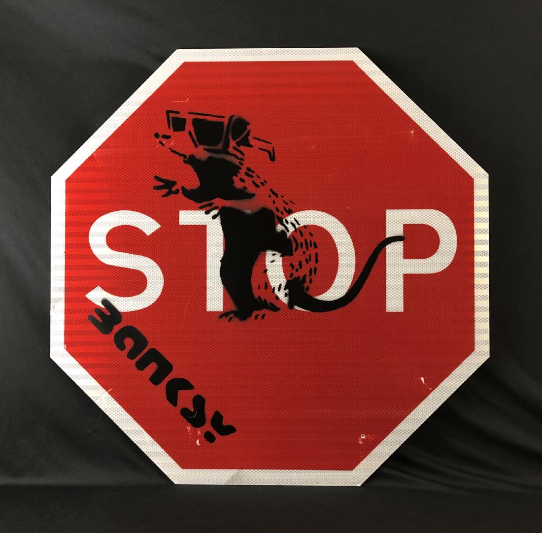 Banksy (1974 -) Large Aerosol Spray Painting - style of: This lot consists of a hand-stenciled aerosol painting on a reclaimed Metal STOP Sign, with "Banksy" hand stenciled by the artist at bottom left. Image depicts an iconic Rat with 3D Glasses. Very simi
