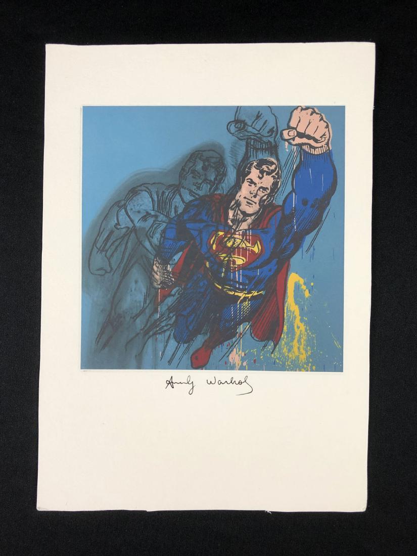Andy Warhol (1928-1987) - Hand Inscribed Fine Art Print: This lot consists of a fine art print on paper, with "Andy Warhol" hand written in ink at bottom. Image depicts the Marvel comic book hero, Superman, soaring into view with a mighty fist extended. He 